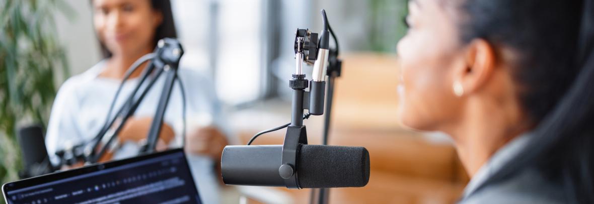 Two women in live podcast