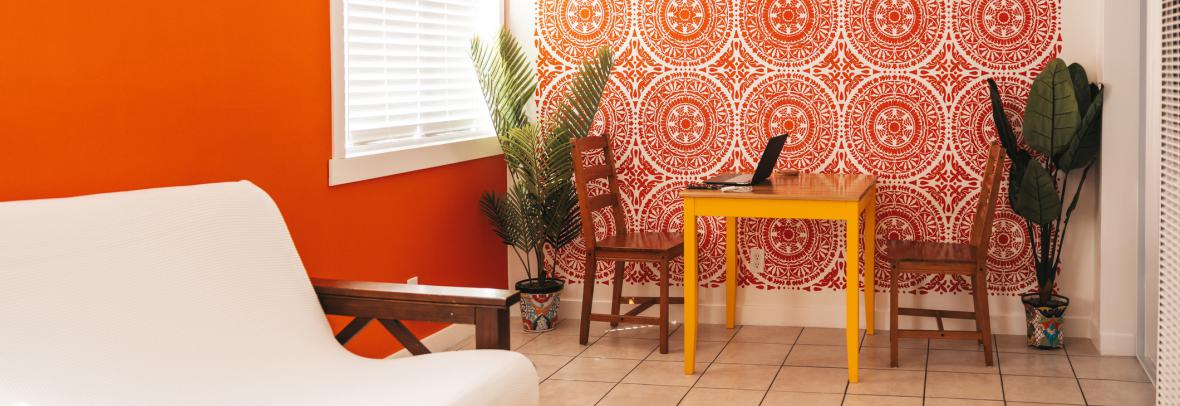 Orange living room city apartment.
